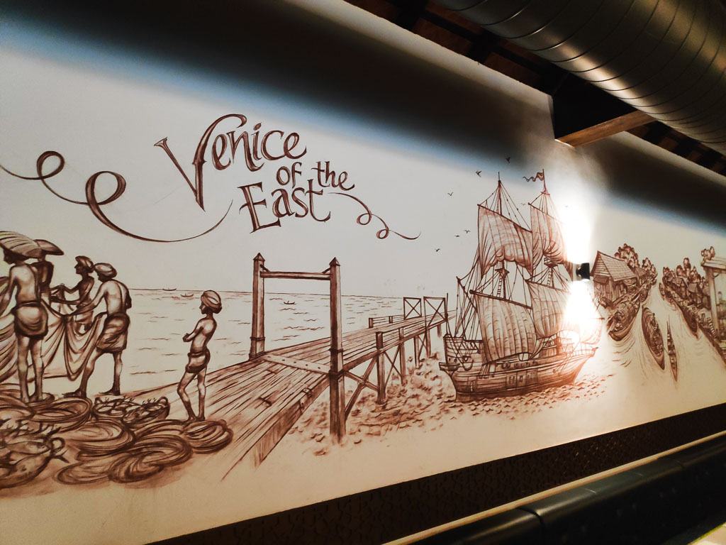 A mural depicting Kochi's harbor trading history